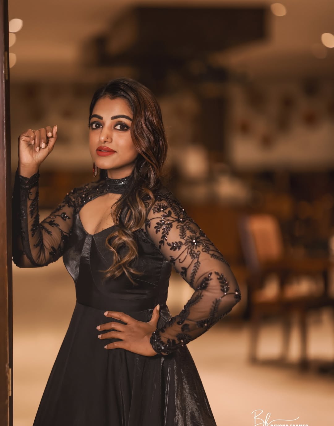 Anchor Meera Radiates Elegance in Her Customised Gown