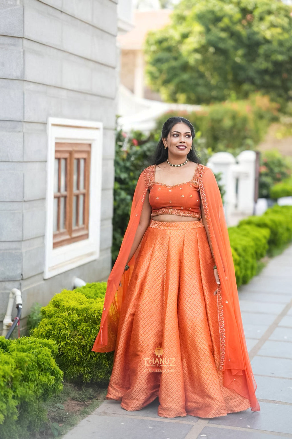 Vibrant Burnt Orange Banarasi Silk Lehenga with Embroidered Cape