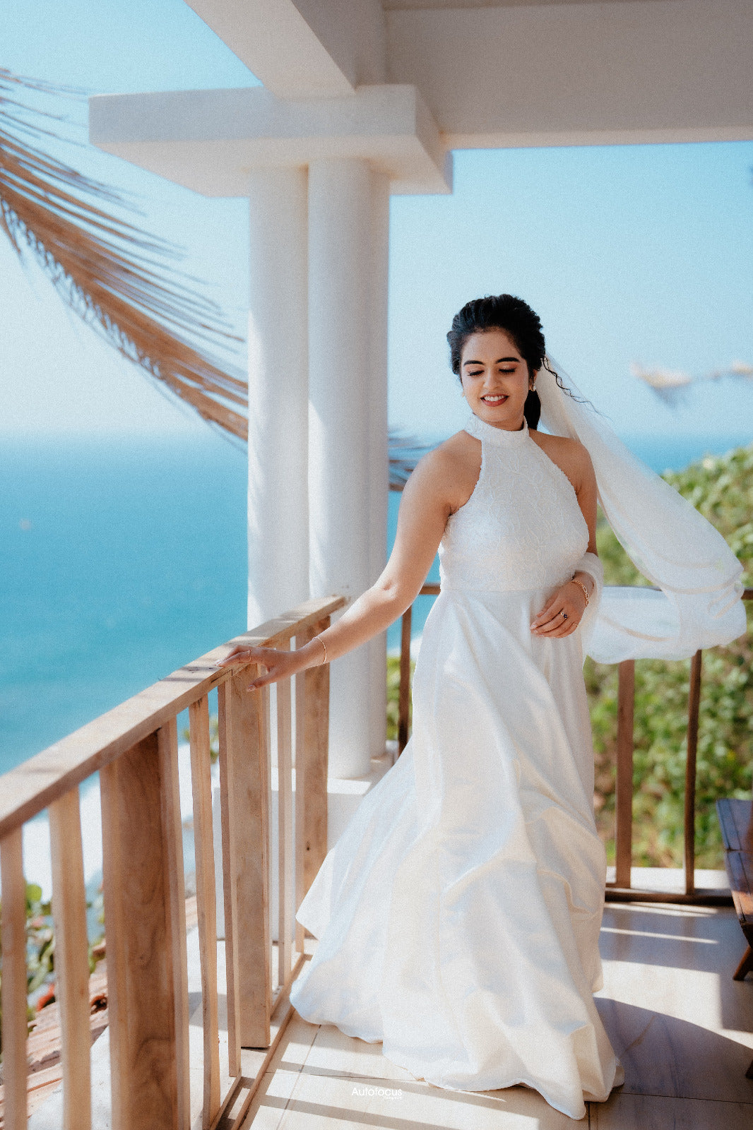 Elegant Pearl White Halter-Neck Satin Gown with Lace Bodice