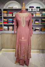 the three elegant Anarkali suits under code AN-4459, crafted from a soft, flowing Chinnon material